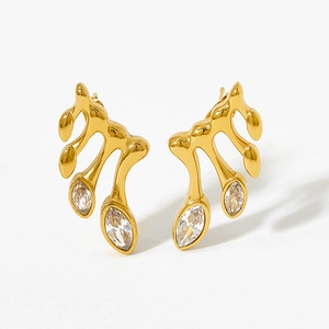 Detailed view of vintage gold branch stud earrings with marquise-cut marquise zircon crystals