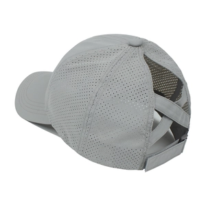 Detail of breathable mesh baseball cap with criss-cross ponytail hole and velcro strap