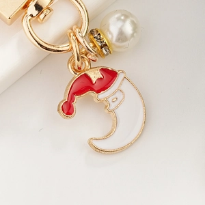 Christmas Santa Claus on moon keychain with gold lobster clasp and white pearl charm