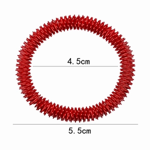 Detail showing red spiked massage ring with 4.5cm inner and 5.5cm outer diameter