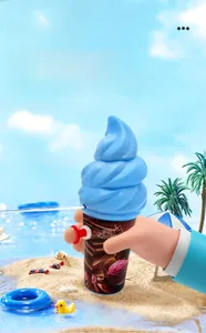 Close-up of mini ice cream shaped water gun for kids with blue spiral top and red trigger