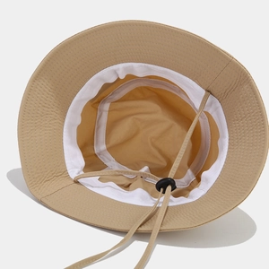 Beige quick-dry sun hat with breathable inner band and adjustable wind rope details