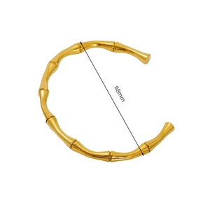 Detailed view of 18k gold plated stainless steel bamboo bracelet with 68mm diameter
