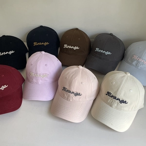 Detailed grid view of cotton baseball caps with Hiranga embroidery in nine assorted colors