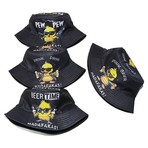 Detail of four black bucket hats with funny yellow duck prints and pew pew slogans