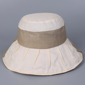 Close-up of lightweight ramie sun hat with natural woven texture and elegant bow detail