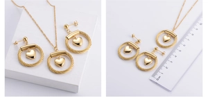Detailed view of gold heart jewelry set with ruler showing 2.5cm pendant diameter