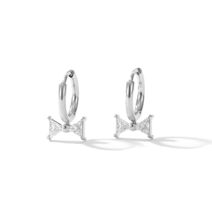 Elegant silver bow earrings with zircon stones on a clean white background