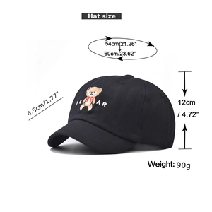 Detail view of cotton baseball cap showing bear embroidery and adjustable size measurements
