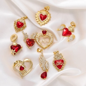 18K gold-plated S925 silver wing heart pendants with red zircon on white silk