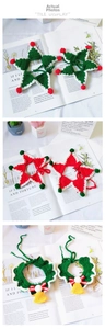 Detailed view of handmade crochet pet Christmas collars with star and wreath designs
