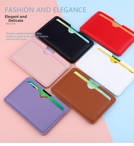 Flat lay of minimalist ultra-slim card holders in six colors with fine stitching details