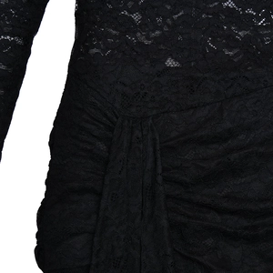 Close-up of black floral lace fabric with delicate pleated waist design and mesh texture