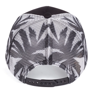 Detail view of the black snapback closure and tropical leaf mesh on the baseball cap
