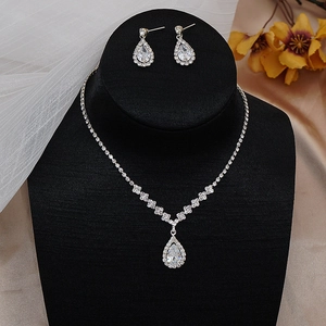 Exquisite silver-tone water drop zircon necklace and earrings bridal jewelry set on a bust