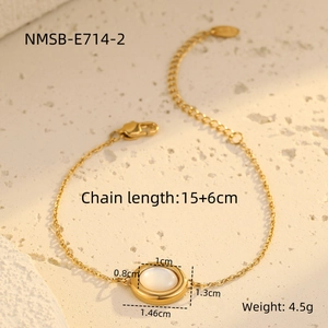 Detailed view of golden oval white shell bracelet with 15 plus 6cm chain length and weight info