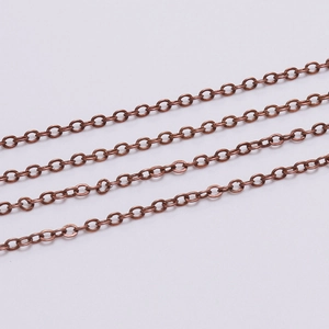 Macro shot of 1.6mm antique copper curb chain links for DIY body jewelry making
