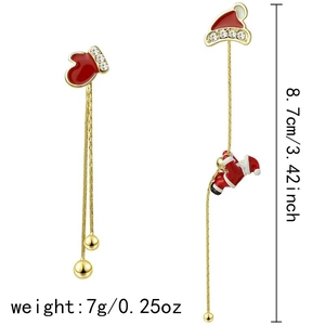 Boucles d'oreilles de Noël asymétriques avec Père Noël grimpant et gants à strass