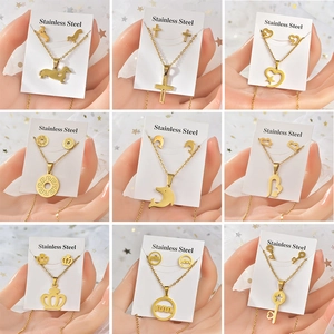 Collection of nine gold stainless steel jewelry sets with animal and geometric designs
