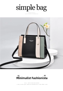 Detailed view of color-block tote bag with vertical stripes and brand logo detail