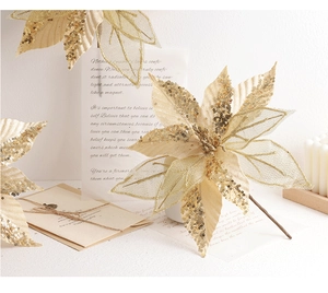 Macro view of 30cm champagne gold artificial poinsettia with glitter mesh petals