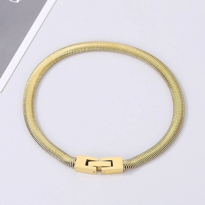 Detailed view of a 5mm golden stainless steel snake chain featuring a secure folding clasp