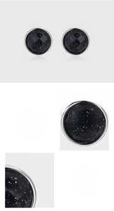 Detailed macro view of S925 sterling silver studs with blue goldstone sand texture