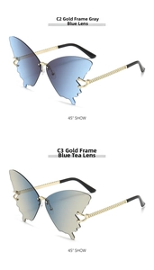 Close-up of butterfly rimless sunglasses featuring gold chain-textured temples and gradient lenses