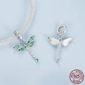 925 silver dragonfly charm with blue-green stones on a mesh bracelet shown from two angles