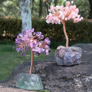 Handmade amethyst and rose quartz crystal money trees with copper wire on fluorite bases