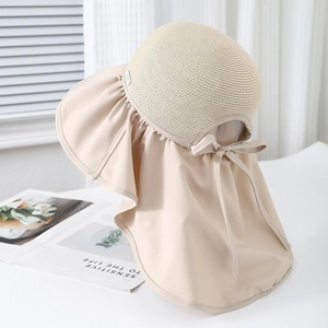 Beige wide brim straw sun hat with neck protection fabric and bow tie for women