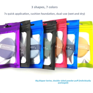 Detailed set of seven colorful air cushion puffs in various shapes with ribbons