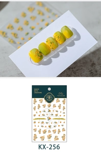 Detail of yellow floral nail stickers model KX-256 with green gradient background