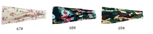 Detailed view of wide yoga headbands in floral and camouflage prints for sport and style