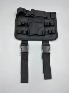 Detail of oxford cloth tactical tool pouch featuring ten elastic slots and quick-release buckles
