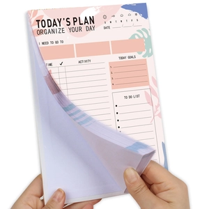 Minimalist daily planner notebook with to-do list and hourly schedule on white paper