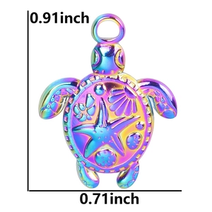 Macro detail of iridescent sea turtle pendant with starfish engraving and dimensions