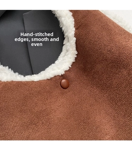 Detail of suede tote bag collar with sherpa trim, smooth stitching, and a brown button