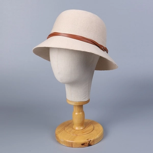 Breathable knit bucket hat in cream white with a slim brown leather strap decoration