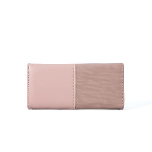 Detail of a pink patchwork long wallet for women featuring epi and smooth leather textures