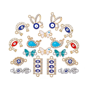 Macro shot of 20pcs evil eye alloy charms and love connectors with crystal rhinestones