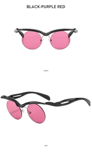 Detail view of stylish black irregular frame sunglasses with purple red round lenses
