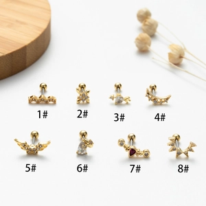 Eight styles of gold stainless steel ear studs with red and clear zircon crystals