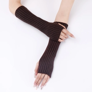 Detailed texture of dark brown ribbed knit arm warmers with thumb holes for winter