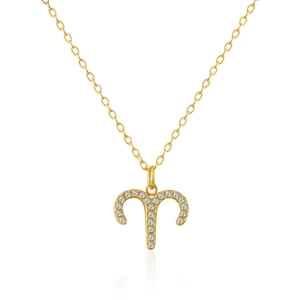 Macro shot of gold Aries pendant with sparkling white cubic zirconia stones on thin chain