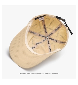 Detail view of the breathable mesh interior and adjustable strap of the beige baseball cap