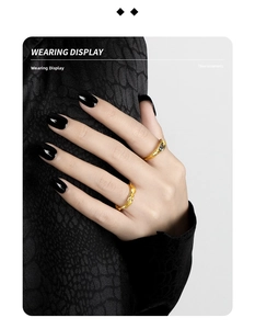 Close-up of gold irregular lava texture S925 rings worn by model with high contrast