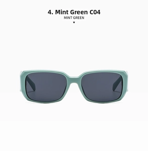 Detail view of mint green rectangular frame sunglasses with dark grey lenses C04