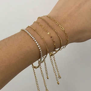 Five-piece set of gold-plated layered chain bracelets with sparkling zircon stone accents