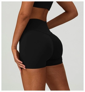 Close-up of the rear view of black high-waisted yoga shorts with butt-lifting seam detail
